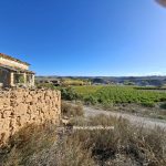 Casa de 305 m2 en Miraflores (Caspe. Aragón) + 3.990m2 regadío. 36.000€